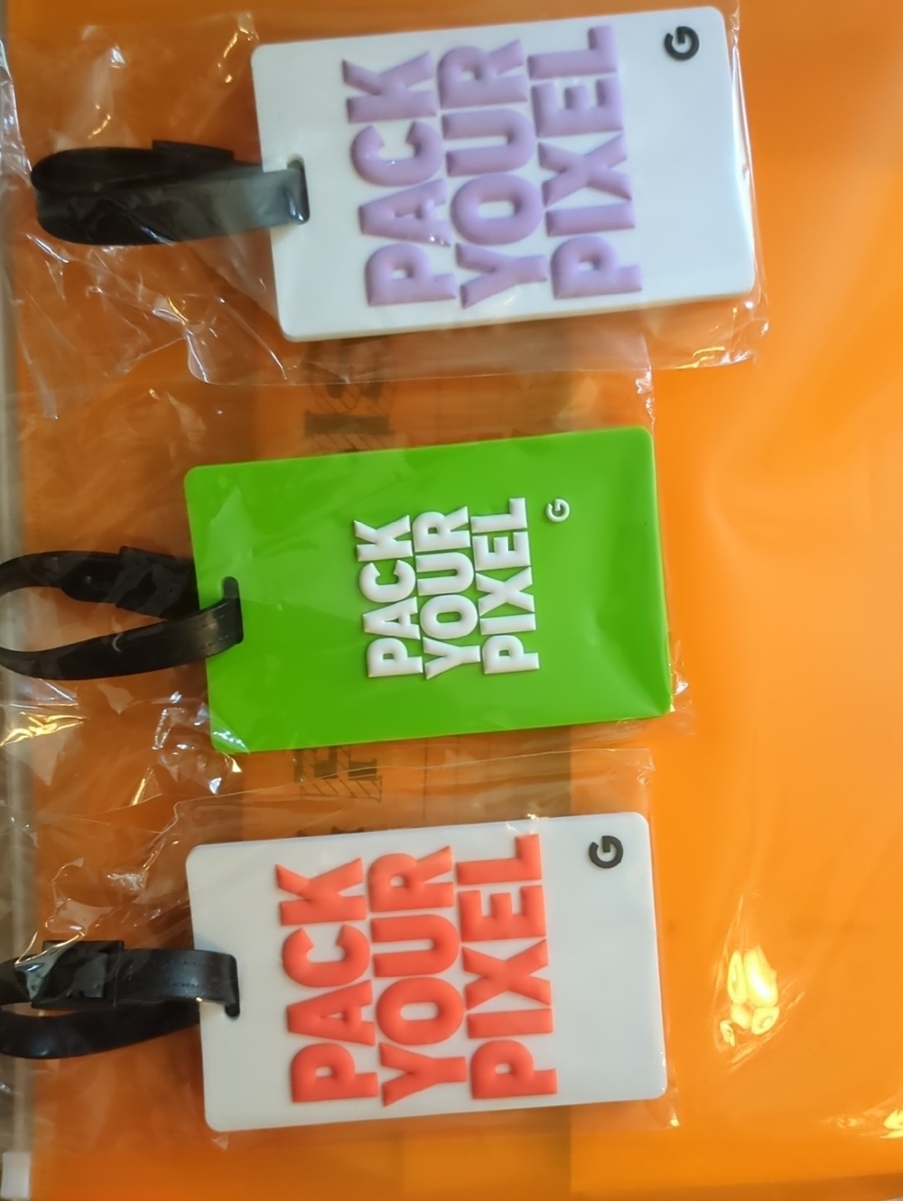 Google Pack Your Pixel Luggage Tags.          3 Options for you to choose from.